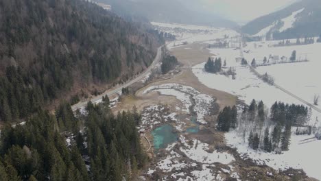 Idyllic-and-snowy-winter-landscape-of-Zelenci-Nature-Reserve