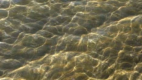 Water-Waves-and-Light-Patterns-in-the-sand