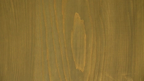 Slow-zoom-out-of-hinoki-wood-showing-concentric-grain-pattern
