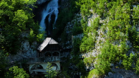Savica-Waterfall-In-Triglav-National-Park-With-A-Lookout-Structure-On-The-Cliff-In-Slovenia