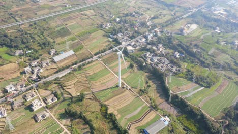 Drone-shots-of-a-large-Chinese-windfarm-located-in-the-valley-of-Sichuan
