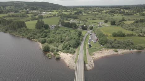 Top-View-Of-Green-Landscape-And-The-Blessington-Bridge-At-Poulaphouca-Reservoir-In-Ireland
