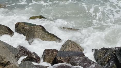 Ocean-waves-hitting-jetty-rocks