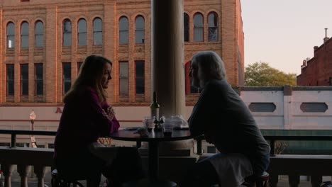 Couple-enjoying-glass-of-wine-at-an-outdoor-bar---Americus-First-Friday-Art-Event-Sumter-County-Georgia