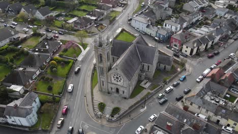 Parish-Church-Of-Assumption-In-Howth-Dublin,-Ireland---aerial-drone-shot