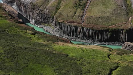 Basalt-columns-at-Studlagil-valley-in-Iceland,-aerial