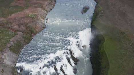 Above-powerful-white-water-rapids-of-Gullfoss-in-Iceland,-tourist-attraction