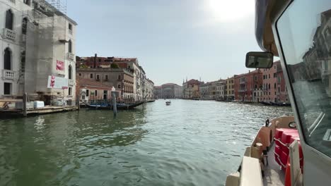 Travelling-Through-Grand-Canal-In-Venice,-Italy,-On-Vaporetto-Public-Waterbus
