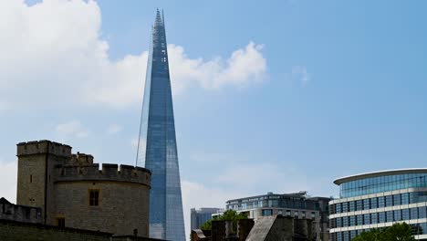 Looking-up-to-The-Shard-from-behind-The-Tower-of-London,-London