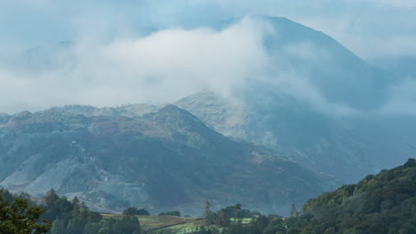 Lake-District-Timelapse-Mist-Swirling-on-Mountains---Cold-Pike-Crinkle-Grags-from-Red-Bank,-Grasmere,-Lake-District-National-Park,-Unesco-World-Heritage