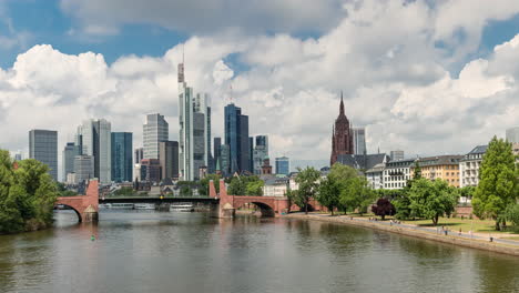 Frankfurt-Skyline---Barge-Cruising-At-Main-River-With-High-rise-Buildings,-Skyscrapers-And-Frankfurt-Cathedral-In-Background-In-Germany