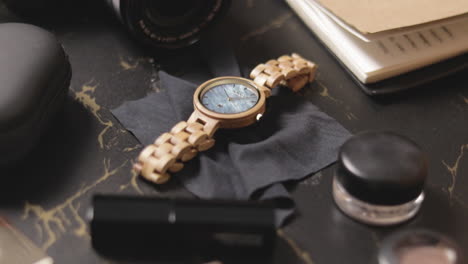 Luxurious-Wood-Watch-For-Women-On-Black-Cloth-On-The-Table