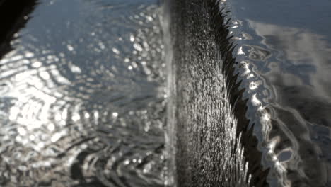 Beautiful-waterfall-effect-at-the-edge-of-a-pool--Close-up