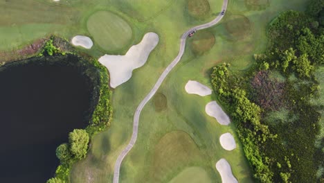 Slow-drone-shot-of-lush-green-golf-course-in-Florida