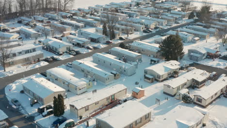 Winter-snowfall,-flakes-on-mobile-home-trailer-park