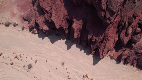 Top-aerial-view-of-a-beautiful-purple-rock-formation-in-a-desert