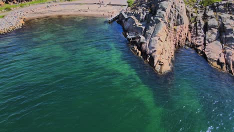 Langevik-Beach-With-Crystal-Clear-Water-During-Summer-In-Lysekil,-Sweden