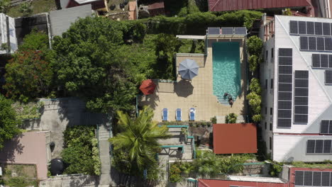 AERIAL---House-and-pool-in-Charlotte-Amalie,-U