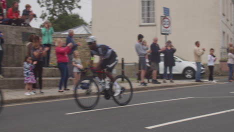 Cyclist-Leaders-of-Tour-of-Britain-2021-Cycling-Road-Race-and-Car-Convoy,-Cornwall,-Slow-Motion