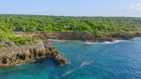 Rocky-cove-along-tropical-coastline-of-Boca-de-Yuma,-Caribbean,-aerial