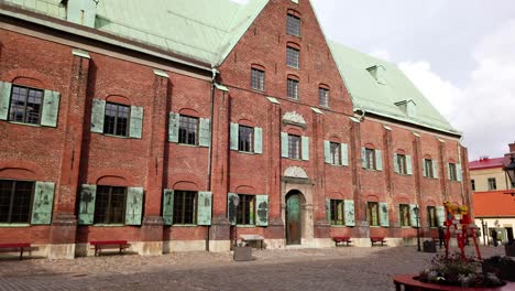 Historic-Kronhuset-red-brick-building-in-Vastra-Nordstaden,-Gothenburg,-Sweden