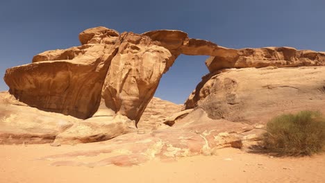 Natural-Arch-Formation-in-Wadi-Rum-Protected-Area,-Jordan-on-Sunny-Day,-Panorama