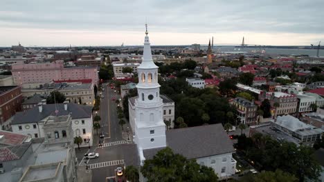 aerial-pullout-from-st-michaels-church-steeple-in-charleston-sc,-south-carolina