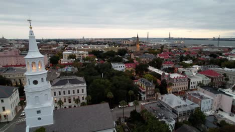 wide-aerial-pullout-past-st-michaels-church-in-charleston-sc,-south-carolina