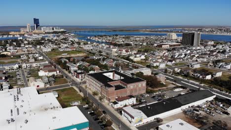 A-wide-aerial-view-of-downtown-tourist-district-of-Atlantic-City,-New-Jersey-on-a-sunny-autumn-day