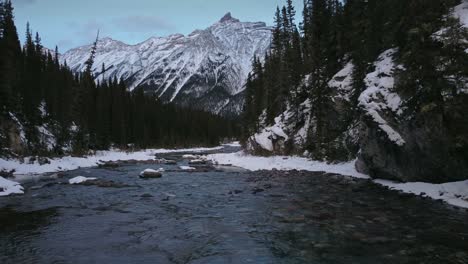 Creek-in-mountain-forest--downstream-winter