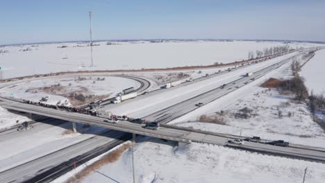 Aerial-footage-of-Canadian-vaccine-mandate-protesters-gathered-on-the-Hwy138-overpass-of-TransCanada-Hwy417