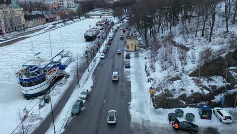Aerial-view-of-cars-driving-slowly-in-city-center-with-flashing-lights-and-horns-blazing-protesting-against-high-fuel-prizes-at-gas-stations