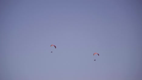 Two-Paragliders-Paragliding-In-Tandem,-Extreme-Flying-Sport