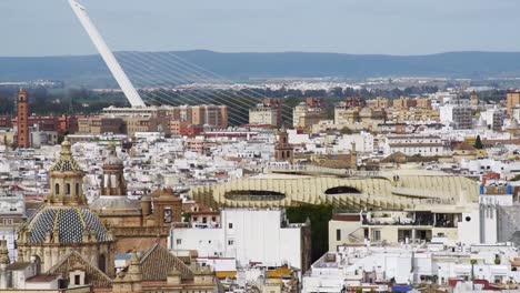 Aerial-view-of-the-Skyline-of-Seville-with-the-setas-de-sevilla-inside-the-old-town