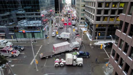Drone-shot-of-Freedom-Trucker-Rally-on-Slater-Street-in-Ottawa,-ON,-Canada-on-January-30,-2022-during-the-COVID-19-pandemic