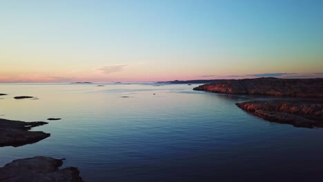 Drone-flying-over-Swedish-waters-during-sundown