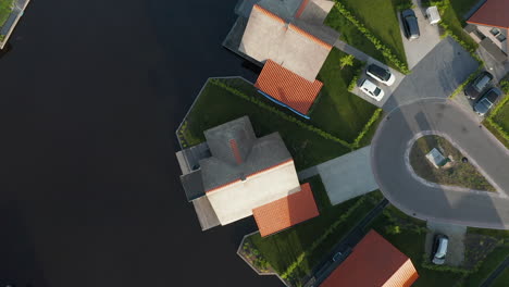 Top-down-View-Of-Villas-On-Water,-Holiday-Resort-Waterstaete,-Ossenzijl,-The-Netherlands---aerial-drone-shot