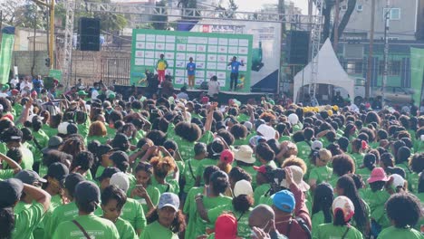 The-women-participant-in-the-first-marathon-2022-are-enjoying-the-program-and-the-presenter-in-the-stage
