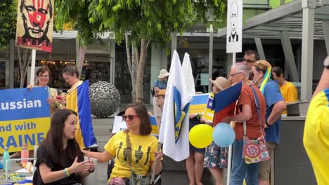 Peaceful-demonstration,-people-gathered-at-Brisbane-square-to-share-and-voice-out-for-the-people-in-Ukraine,-showing-love-and-supports-and-protest-against-war-and-against-Russian's-unlawful-invasion