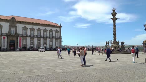 People-Enjoying-Sunny-Day-in-Pillory-of-Porto-Square