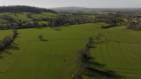 Flat-Valley-Landscape-Broadway-Village-Green-Fields-Winter-Aerial-Establishing-Shot-Worcestershire-UK