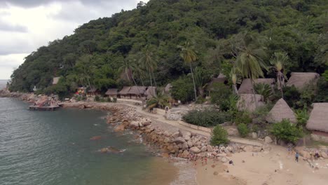 Scenic-View-Of-Rocky-Beach-In-Yelapa,-Jalisco,-Mexico---aerial-drone-shot