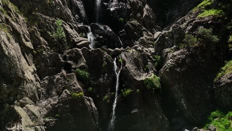 HE-SPECTACULAR-MEANCERA-WATERFALL-IN-THE-NORTH-OF-EXTREMADURA-LANDSCAPED-IN-A-NATURAL-PLACE-A-WATERFALL-100-RECORDED-WITH-MAVIC-3-IN-C4K-30FPS-AND-WITHOUT-COLOR-CORRECTION