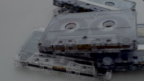 Old-School-Retro-Music-Cassette-Tapes-Being-Places-On-Top-Of-Each-Other
