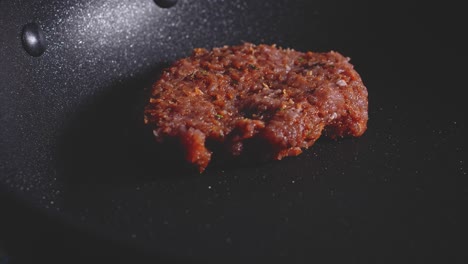 Cooking-Burger-Patty-Made-Of-Lean-Ground-Turkey-In-A-Non-stick-Skillet