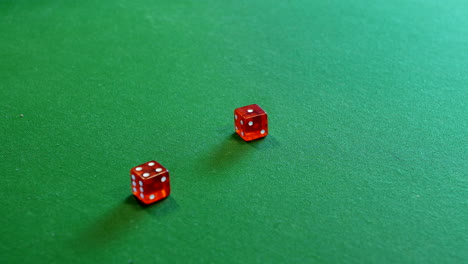 Rolling-five-to-lose-at-craps-on-a-green-casino-table