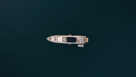 Aerial-Directly-Above-Luxury-Yacht-Boat-in-Blue-Mediterranean-Sea