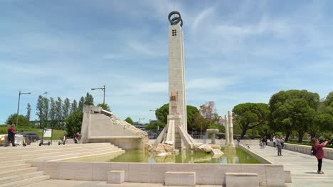 Monument-to-the-25th-April-Revolution-by-Portuguese-sculptor-João-Cutileiro-in-Park-of-Eduardo-VII-on-Sunny-Day-in-Lisbon