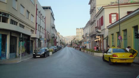 Cars-parked-on-a-street-in-Athens,-Greece
