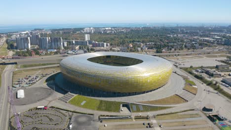 Long-Orbiting-Shot-Above-Gdansk-Stadium,-Home-to-Lechia-Soccer-Team-in-Poland